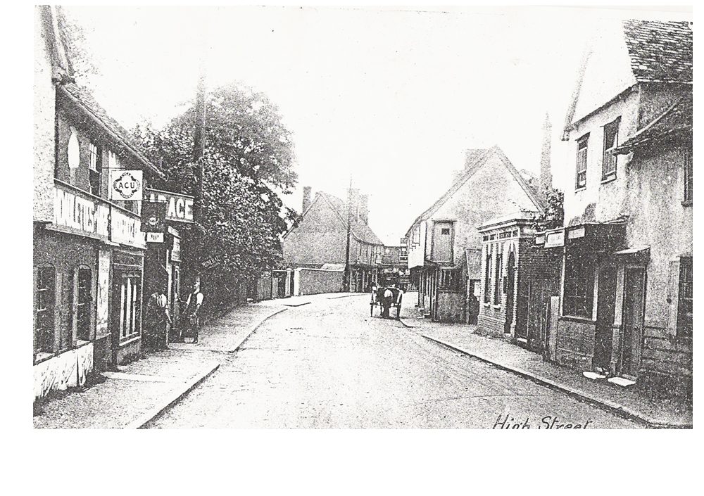 An early photograph of Puckeridge High Street, with a horse and cart in the road